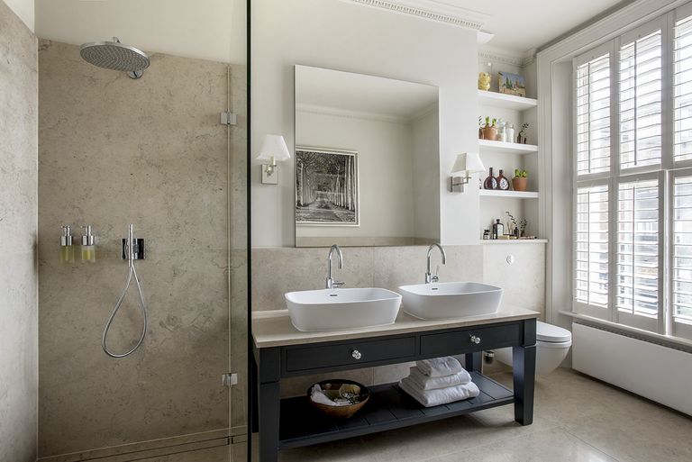 Small bathroom with vanity and mirror by Sims Hilditch