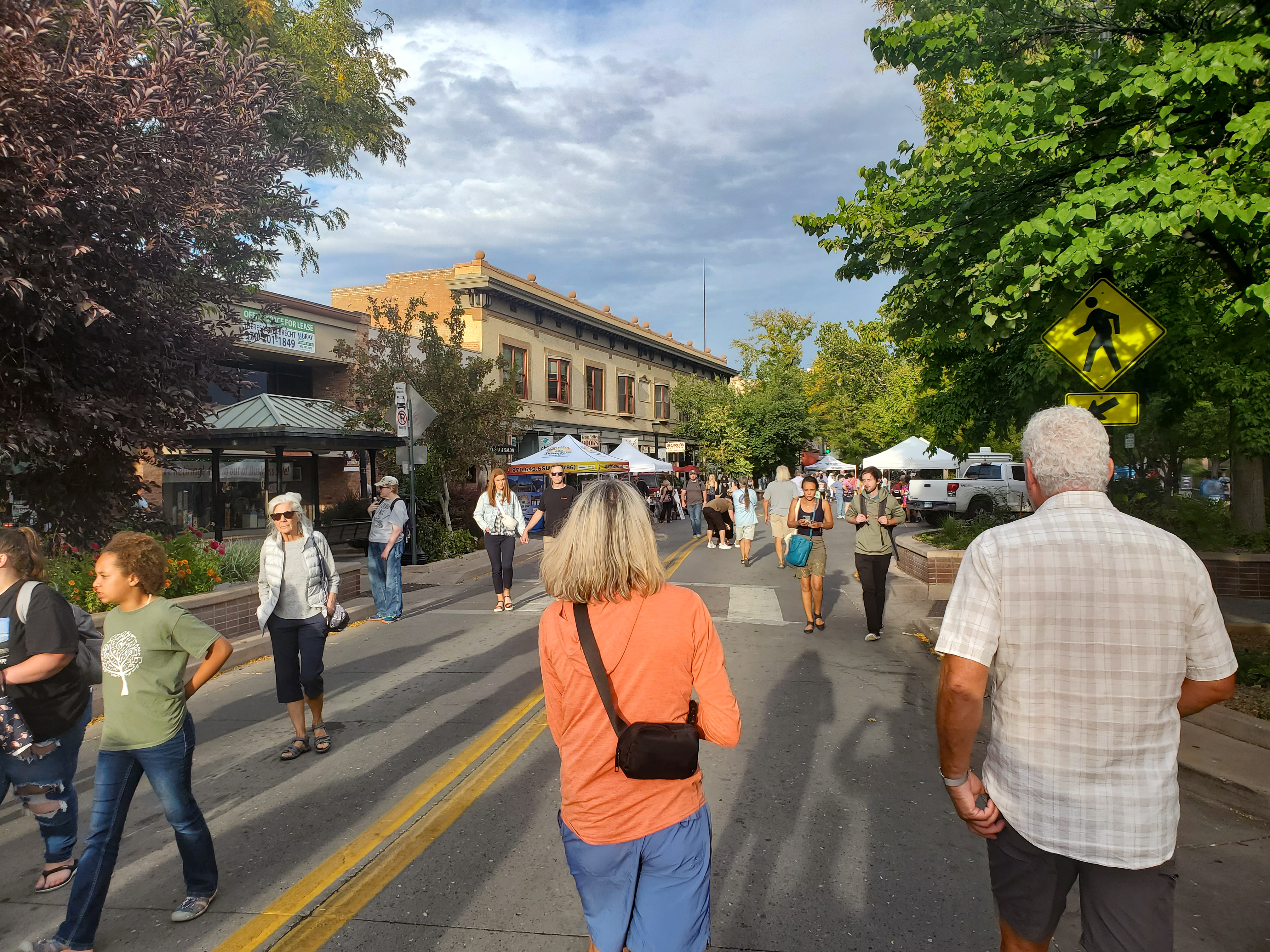 Shoppers stroll down Main Street in Grand Junction, Colorado