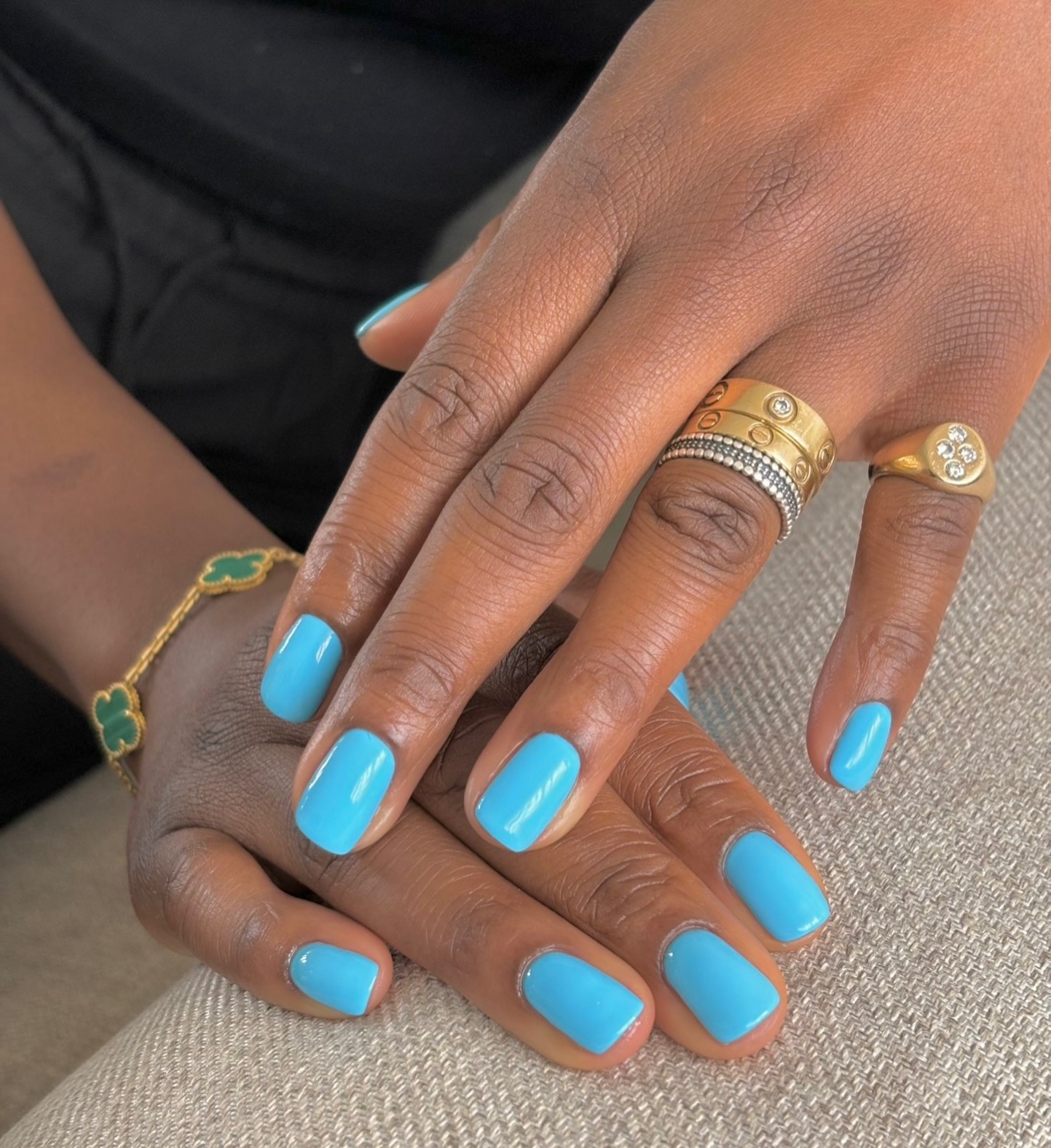 Light blue nails.