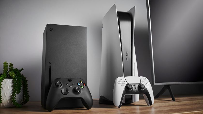 Living room with Microsoft Xbox Series X (L) and Sony PlayStation 5 home video game consoles alongside a television and soundbar, taken on November 3, 2020.