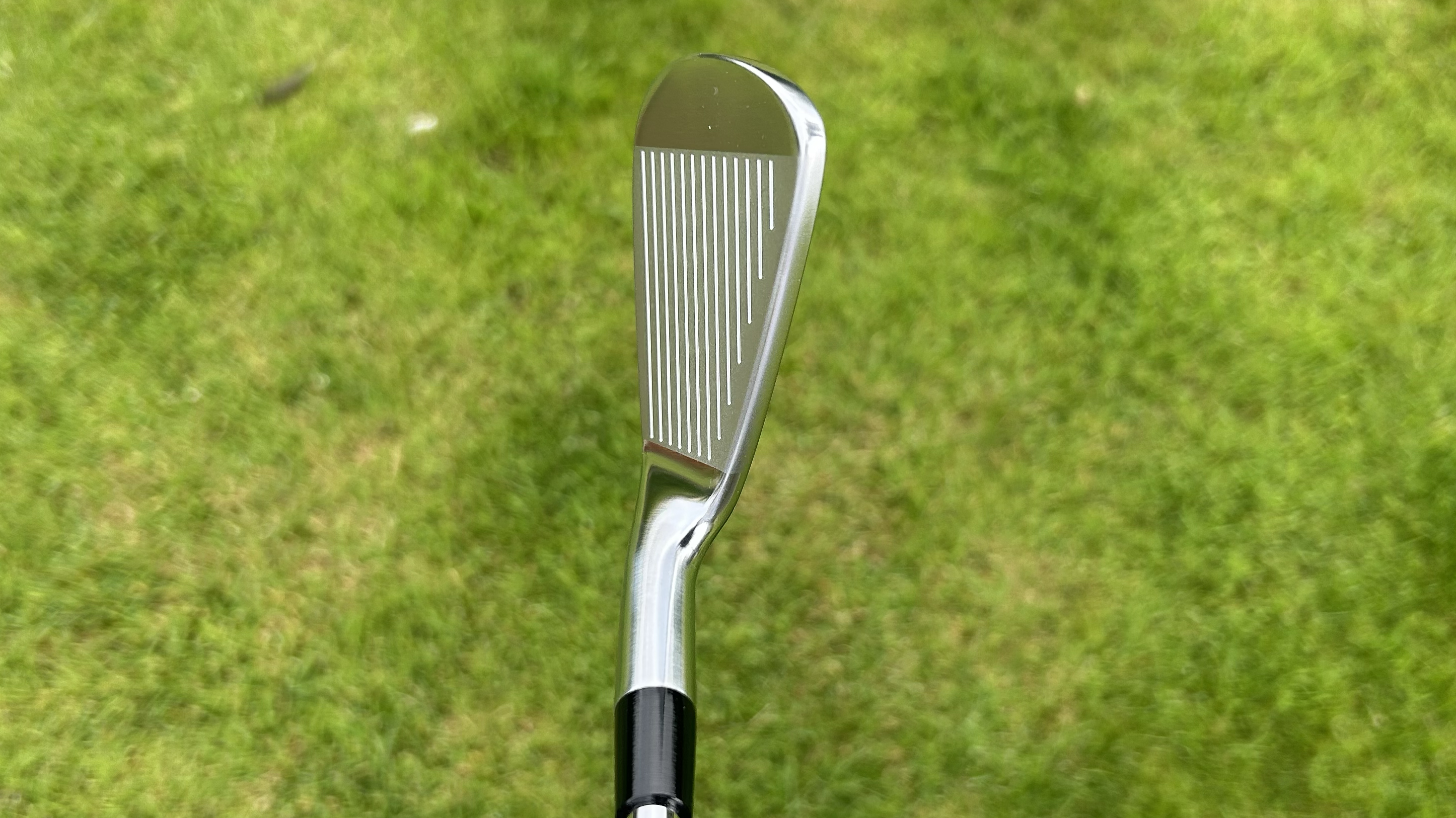 Photo of the New Level Golf 702 CB Irons at address