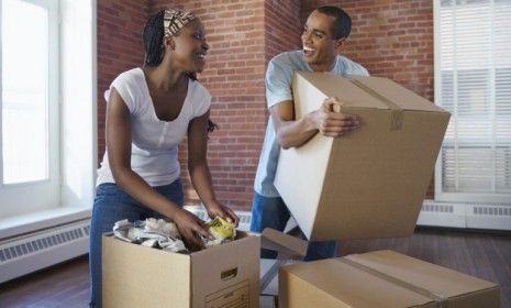 Young, unmarried couples are moving in for love and money.