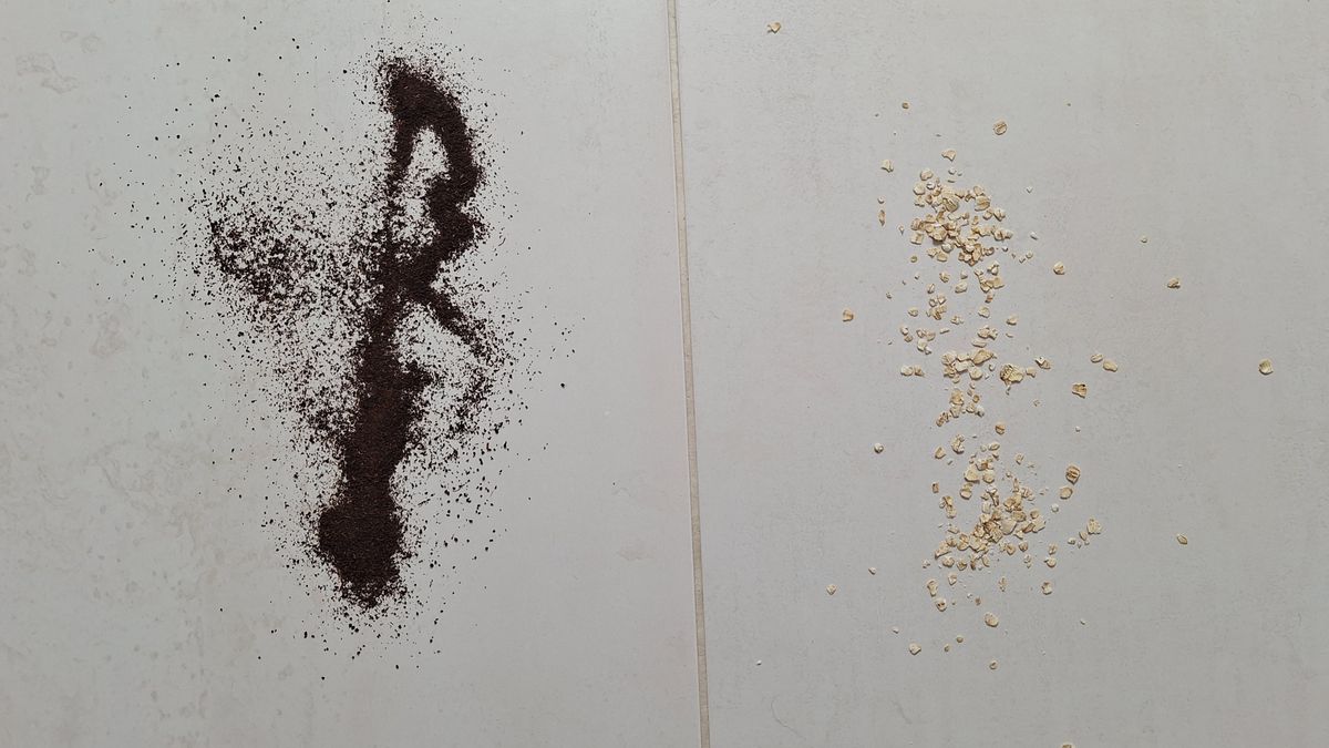 Loose tea and oats on tiled floor, ready for vacuuming test