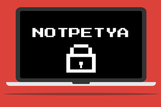 Graphic showing the NotPetya logo on a laptop