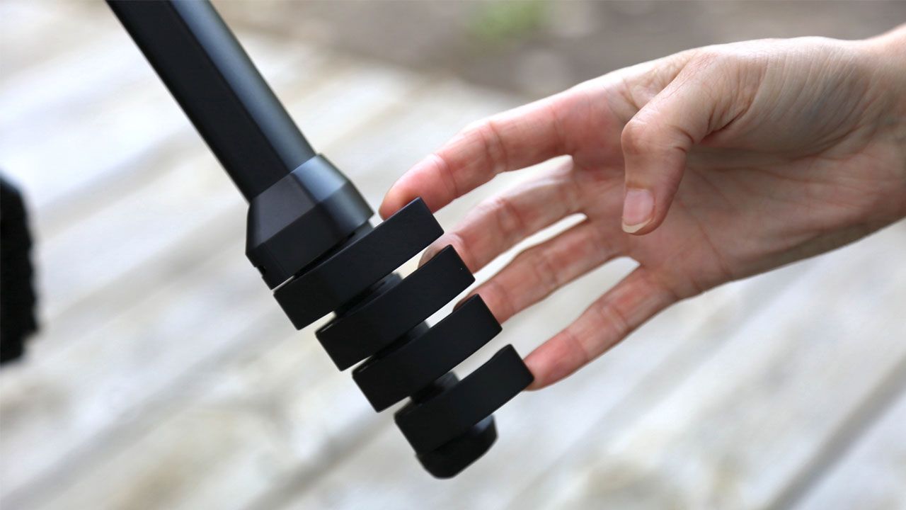 Peak Design Travel Tripod Review: Image shows hands manipulating tripod
