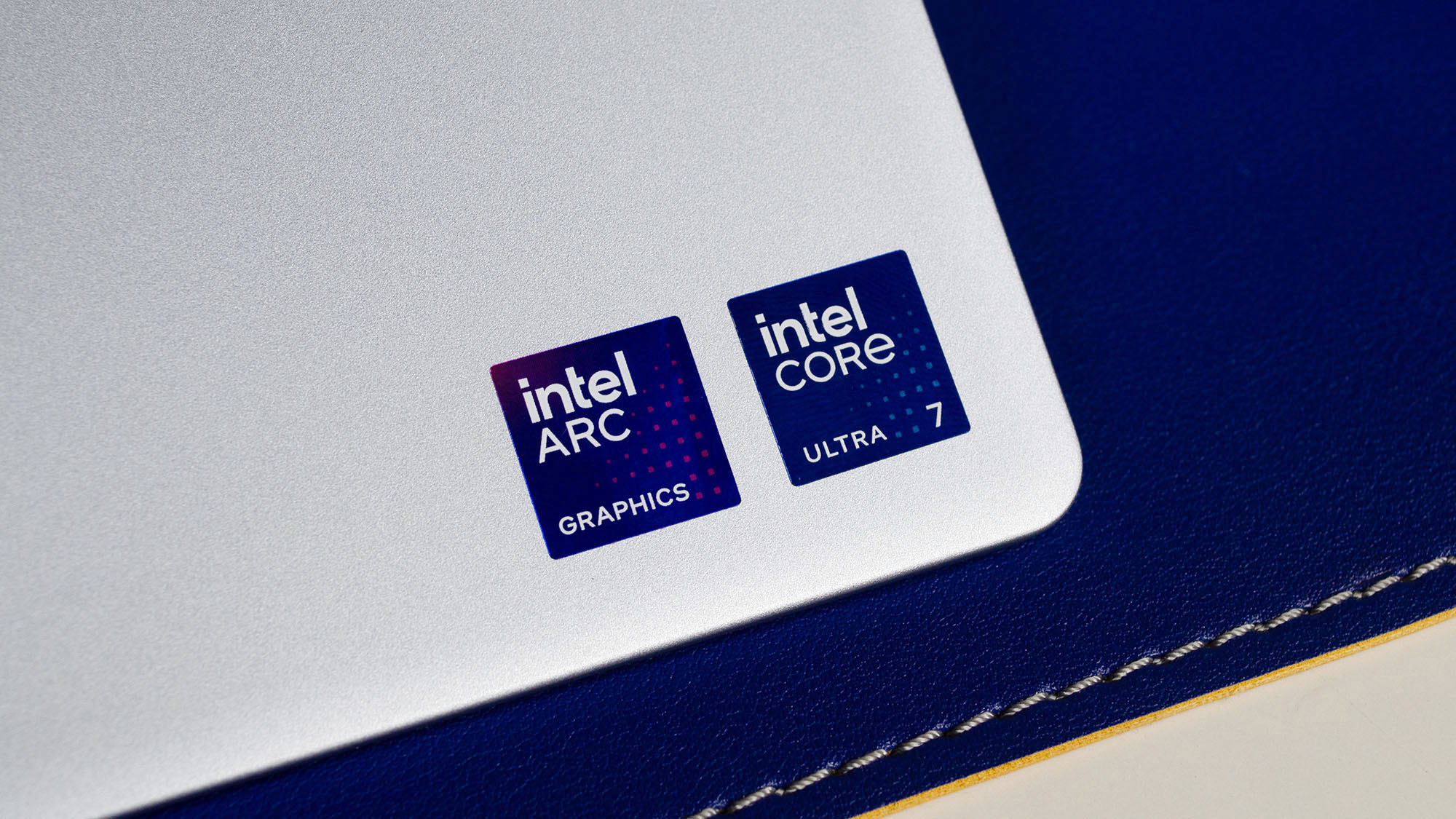 The Intel Core Ultra 7 and Intel Arc Graphics badges on the Dell 14 Plus 2-in-1