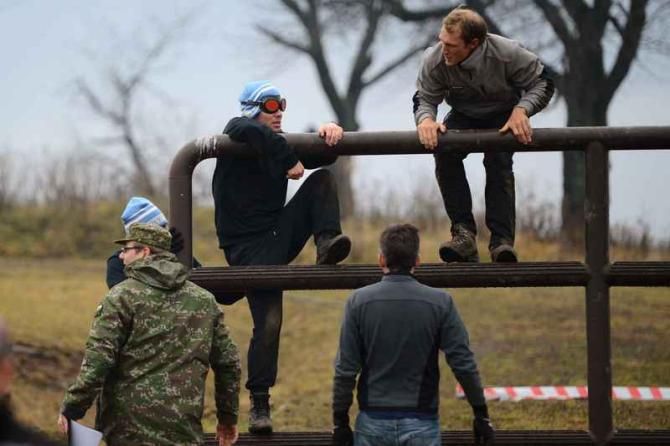 Flying blind... Mark Cavendish is guided though an obstacle course