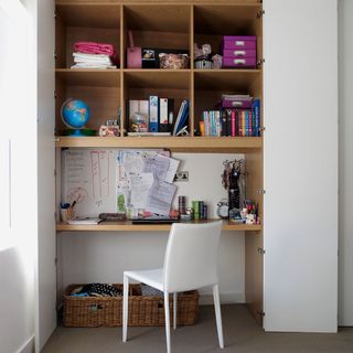 white cupboard office with wooden shelf