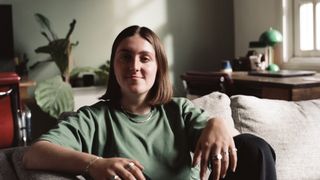 Alice Sherwin in a green t-shirt