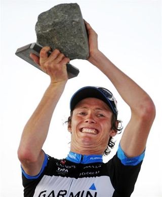 Johan Van Summeren raises the famous Pari-Roubaix winner's cobblestone trophy