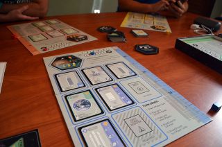 Xtronaut in action: Up to four players can compete to launch solar system missions, earning points as they do.