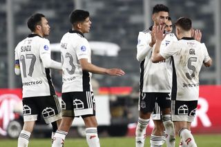 Colo-Colo players celebrate a win over Internacional in the Copa Libertadores in June 2022.
