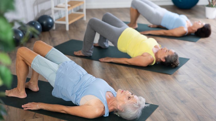 three woman doing a glute bridge on mats