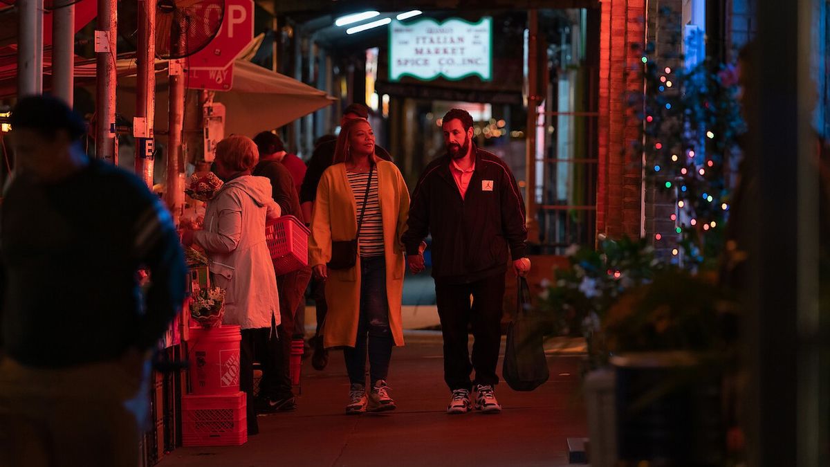 Queen Latifah and Adam Sandler walking in new movie Hustle