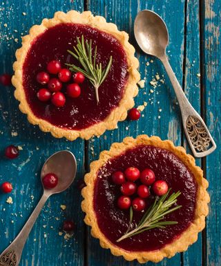 rosemary decor on festive tarts with spoons