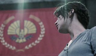 Jennifer Lawrence as Katniss volunteers as tribute in The Hunger Games