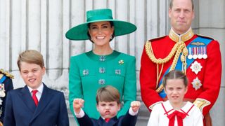 Prince George of Wales, Prince Louis of Wales, Catherine, Princess of Wales, Princess Charlotte of Wales and Prince William, Prince of Wales watch an RAF flypast from the balcony of Buckingham Palace during Trooping the Colour on June 17, 2023 in London, England