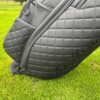 The quilted sides of the Ben Hogan Signature Synthetic Leather stand bag