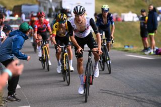 Juan Ayuso (UAE Team Emirates) attacks the GC group – including Sepp Kuss, Primož Roglič, and Enric Mas – on stage 13 of the 2023 Vuelta a España