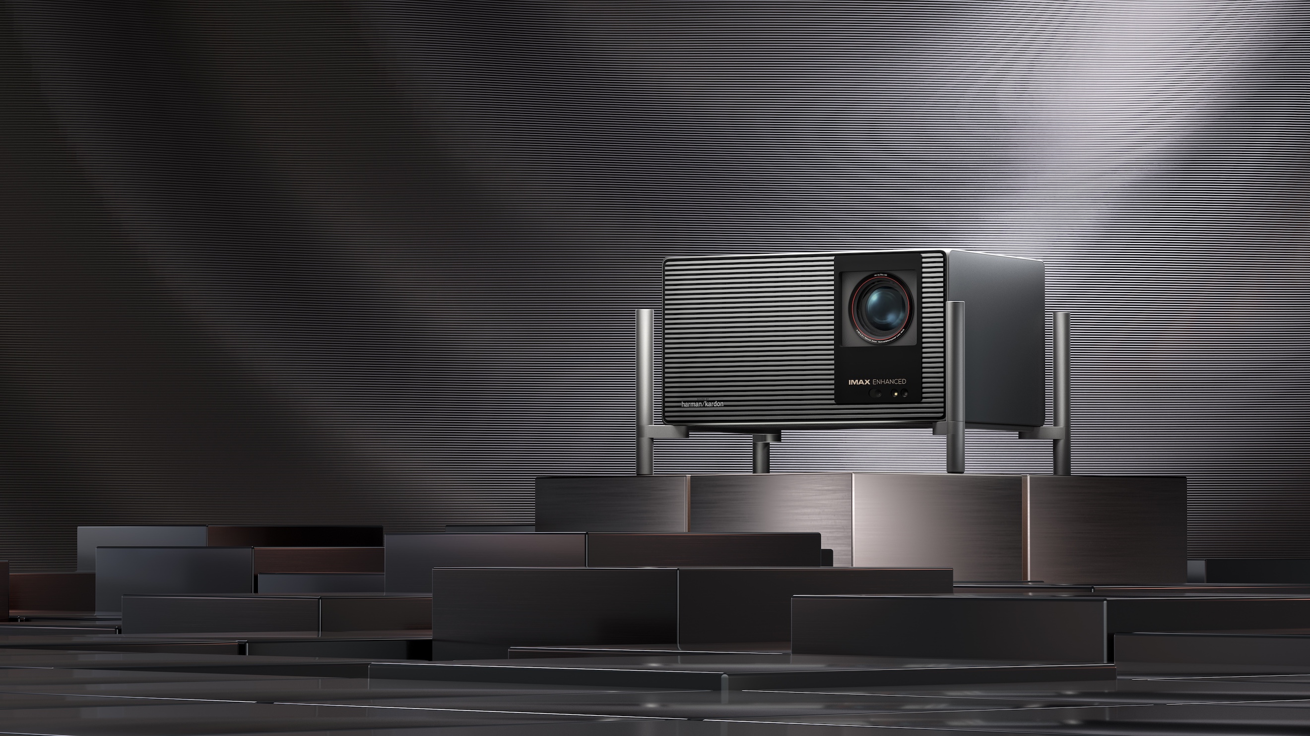 The Xgimi Titan Noir Max projector standing on a series of boxes.