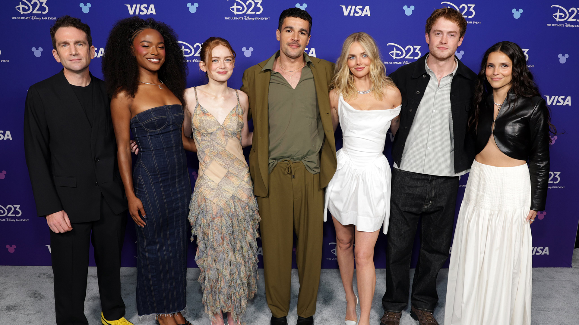 Jake Schreier, Maya Boyd, Sadie Sink, Christopher Abbott, Samara Weaving, Kit Connor, and Inde Navarrette posing for a photo at D23 Expo 2026