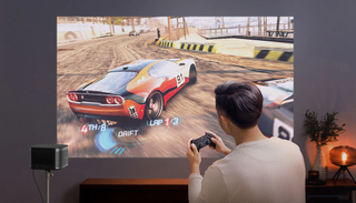 XGIMI Horizon projecting a racing video game