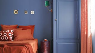 A room painted in Benjamin Moore Blue nova to illustrate bedroom trends 2024
