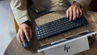 A promotional image for the HP EliteBoard G1a AI PC