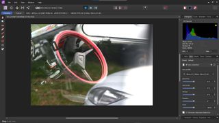 Image shows Affinity Photo in use on a photo of a car interior.