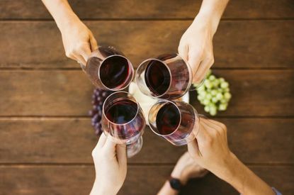 toasting with wine