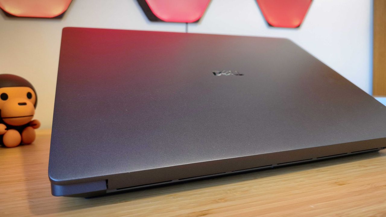 A Dell Pro Max 18 Plus laptop on a wooden desk