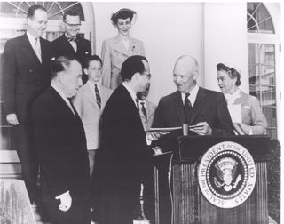 President Dwight Eisenhower awarded Dr. Jonas Salk for his polio vaccine.