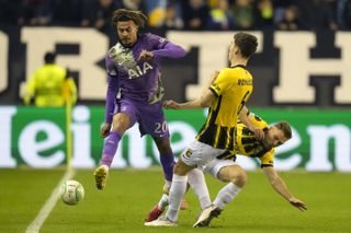 Dele Alli, left, challenges for the ball with Vitesse’s Jacob Rasmussen