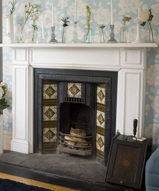 fireplace with shelves and vase