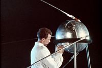 A Soviet technician works on Sputnik 1 before its launch in 1957.