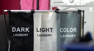 Three laundry baskets for darks, lights and coloureds