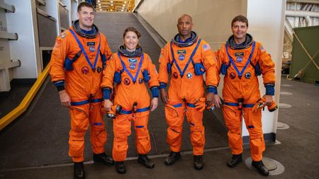 The Artemis 2 moon astronauts pose in the well deck of the USS San Diego during recovery exercises on Feb. 25, 2024. From left: Canadian Space Agency mission specialist Jeremy Hansen, NASA mission specialist Christina Koch, NASA pilot Victor Glover and NASA commander Reid Wiseman.