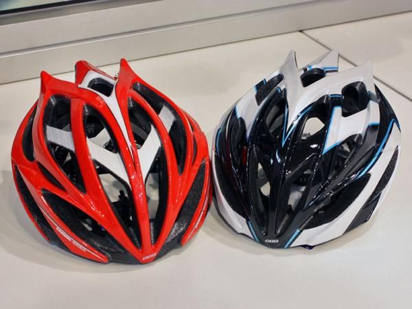 The new BBB Falcon helmet (left) features a carbon fiber and aluminum internal reinforcement structure, 23 gaping vents and deep internal channeling. The less expensive Fenix (right) does with a more conventional internal skeleton and slightly smaller vents and shallower channeling but a nearly identical appearance.