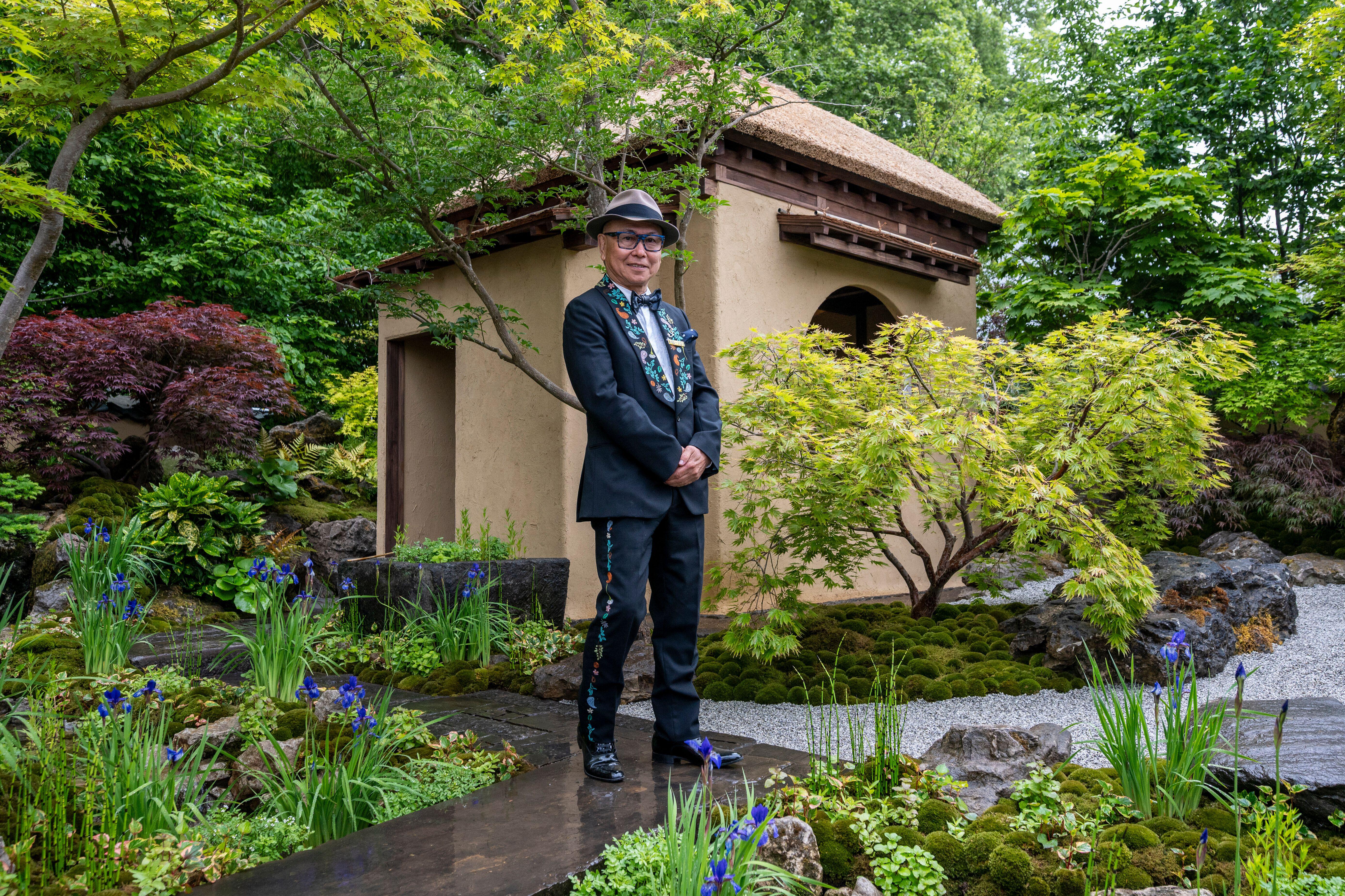 Garden designer Kazuyuki Ishihara with his show garden Cha No Niwa – Japanese Tea Garden at the press day of the 112th RHS Chelsea Flower Show