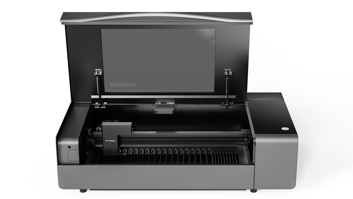 xTool P2;  silver laser cutter with its lid open