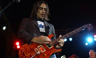 Nuno Bettencourt performs at the Hollywood RockWalk of Fame at Paris Las Vegas in Las Vegas, Nevada in 2004