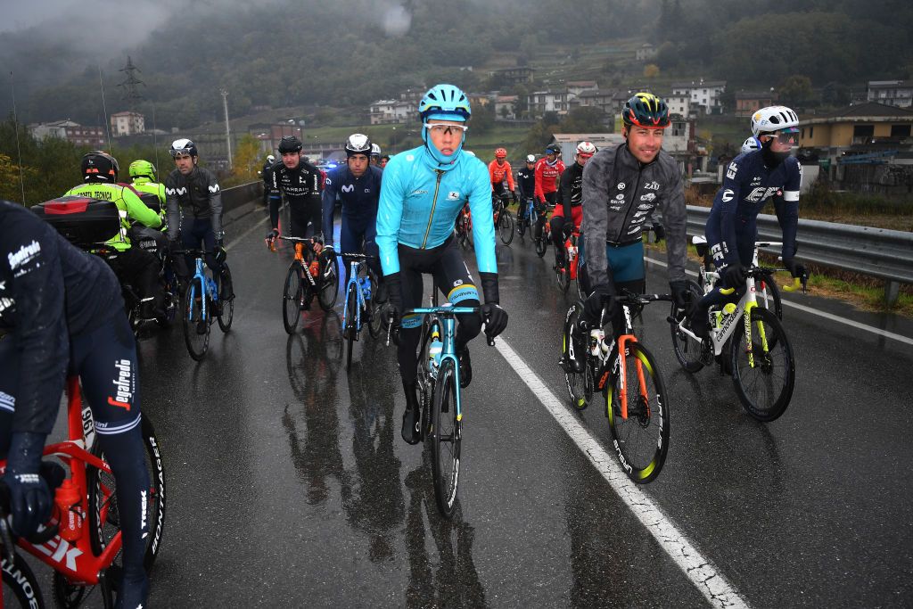 ASTI ITALY OCTOBER 23 Jonas Gregaard of Denmark and Astana Pro Team Simone Bevilacqua of Italy and Team Vini Zabu KTM James Whelan of Australia and Team EF Pro Cycling Race neutralised due to heavy rain and team riders protest during the 103rd Giro dItalia 2020 Stage 19 a 258km stage from Morbegno to Asti girodiitalia Giro on October 23 2020 in Asti Italy Photo by Tim de WaeleGetty Images