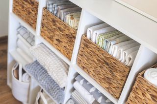 Bed linen storage with baskets