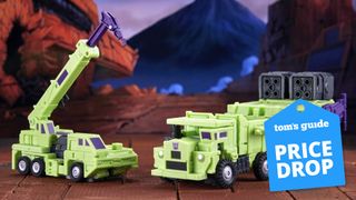 Promotional image of Long Haul and Hook Transformers toys with 'Price Drop' badge overlaid