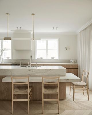 Marble kitchen island by AOJN Interiors