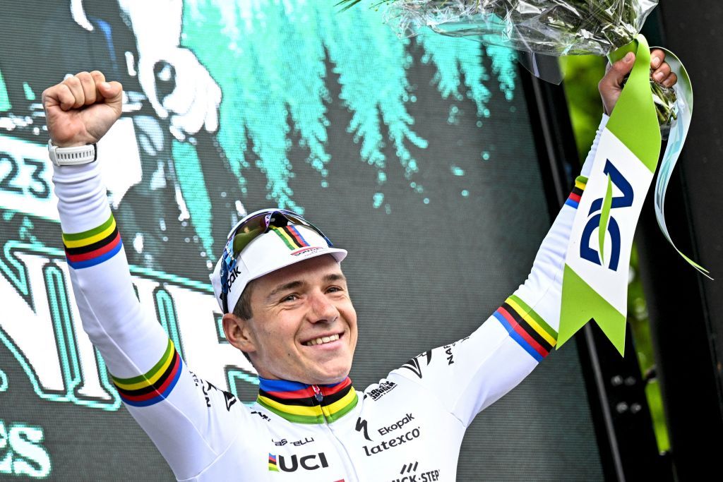 Soudal QuickSteps Belgian rider Remco Evenepoel celebrates his victory on the podium after winning the mens elite race of the LiegeBastogneLiege one day cycling event 2585 km roundtrip from Liege via Bastogne on April 23 2023 Photo by JASPER JACOBS Belga AFP Belgium OUT Photo by JASPER JACOBSBelgaAFP via Getty Images