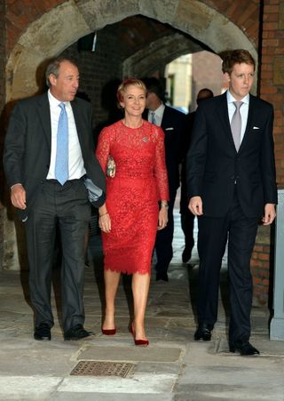 Michael and Julia Samuel arrive with Earl Grosvenor (left to right) at Chapel Royal in St James's Palace, central London for the christening of Prince George of Cambridge.