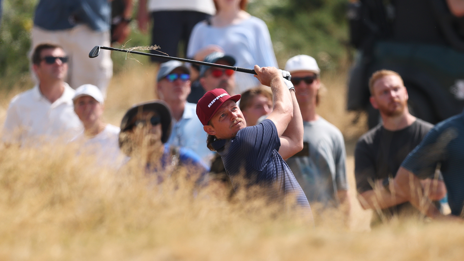 Cameron Smith hits a wedge out the rough