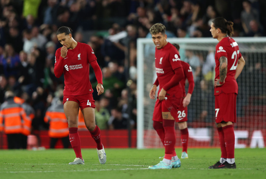 Virgil van Dijk of Liverpool looks dejected after Crysencio Summerville (not pictured) of Leeds United scores their team's second goal during the Premier League match between Liverpool FC and Leeds United at Anfield on October 29, 2022 in Liverpool, England.