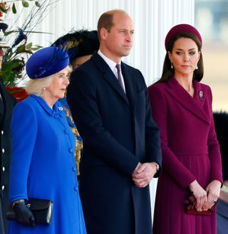 Queen Camilla stands next to Prince William and Princess Kate